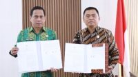 Wali Kota Kotamobagu bersama dengan kepala BPN Kotamobgu.
